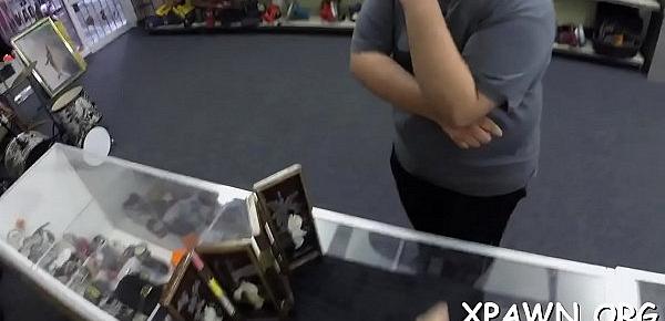  Young woman shows us how that babe has some sex in shop room